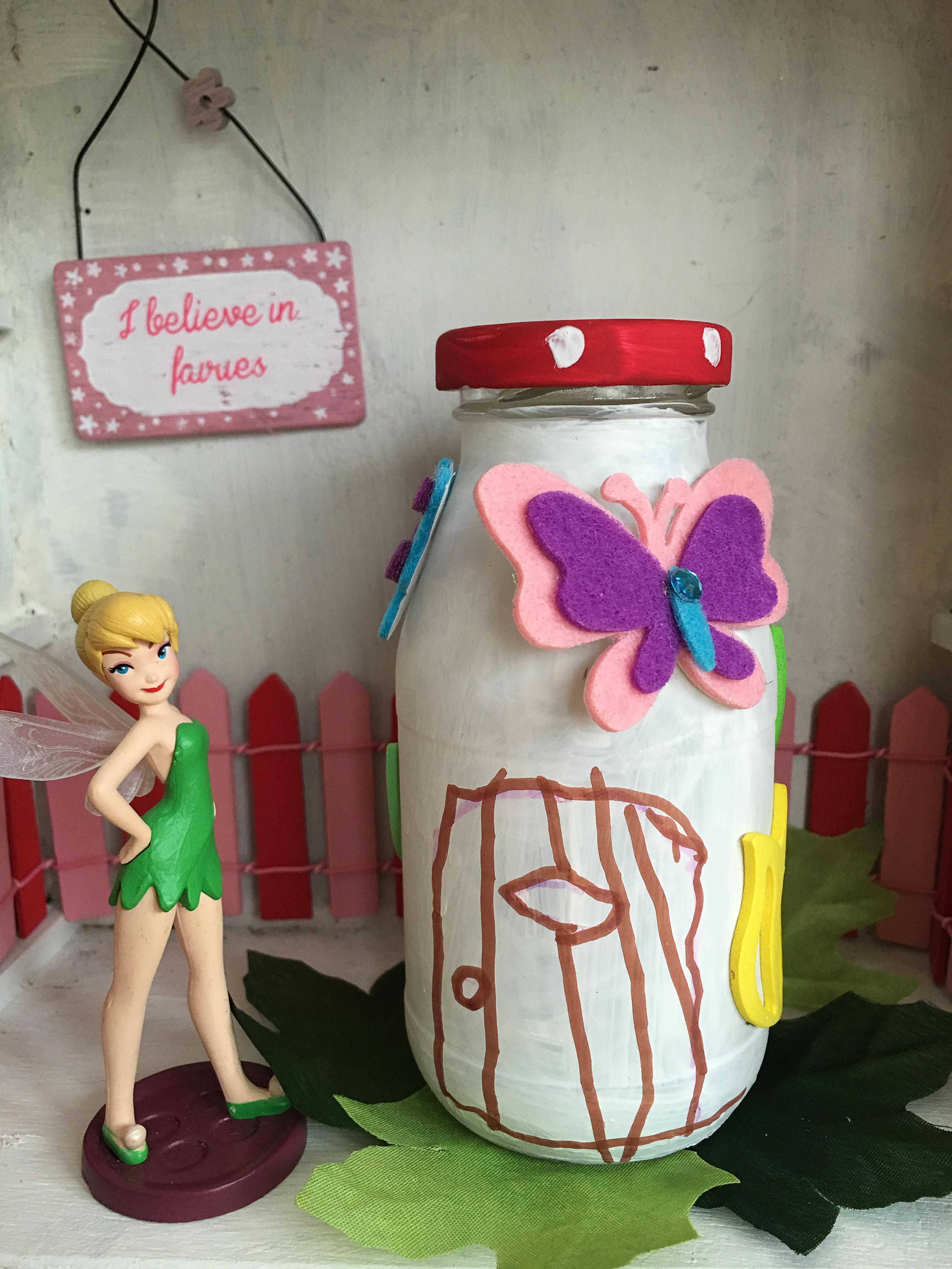 decorated bottle fairy house