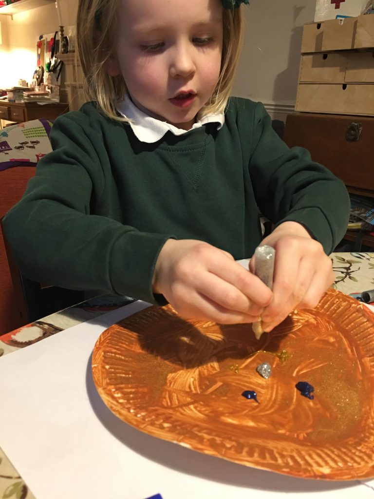 Gingerbread man paper plate with glitter pens