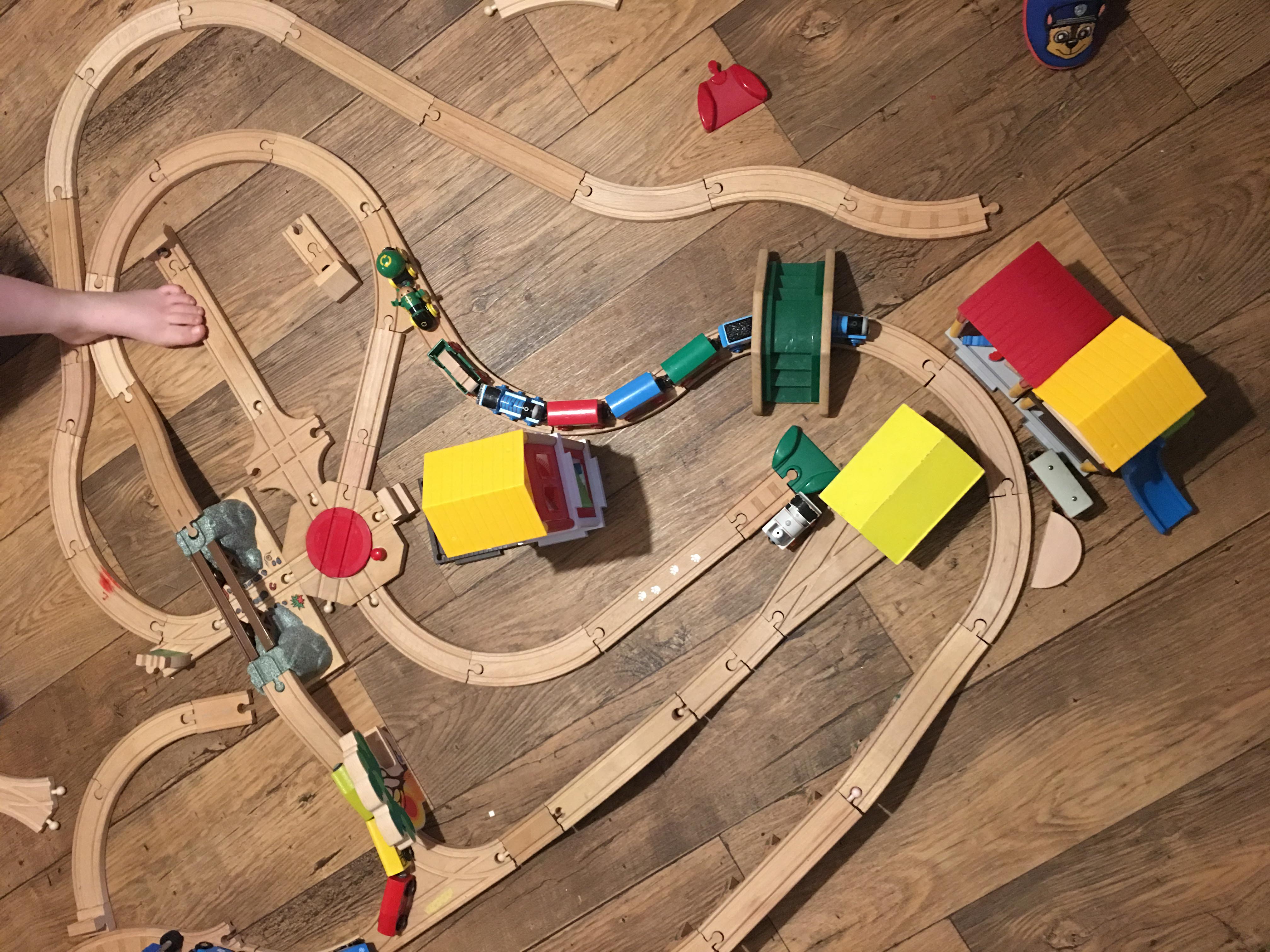 floor covered in BRIO train set