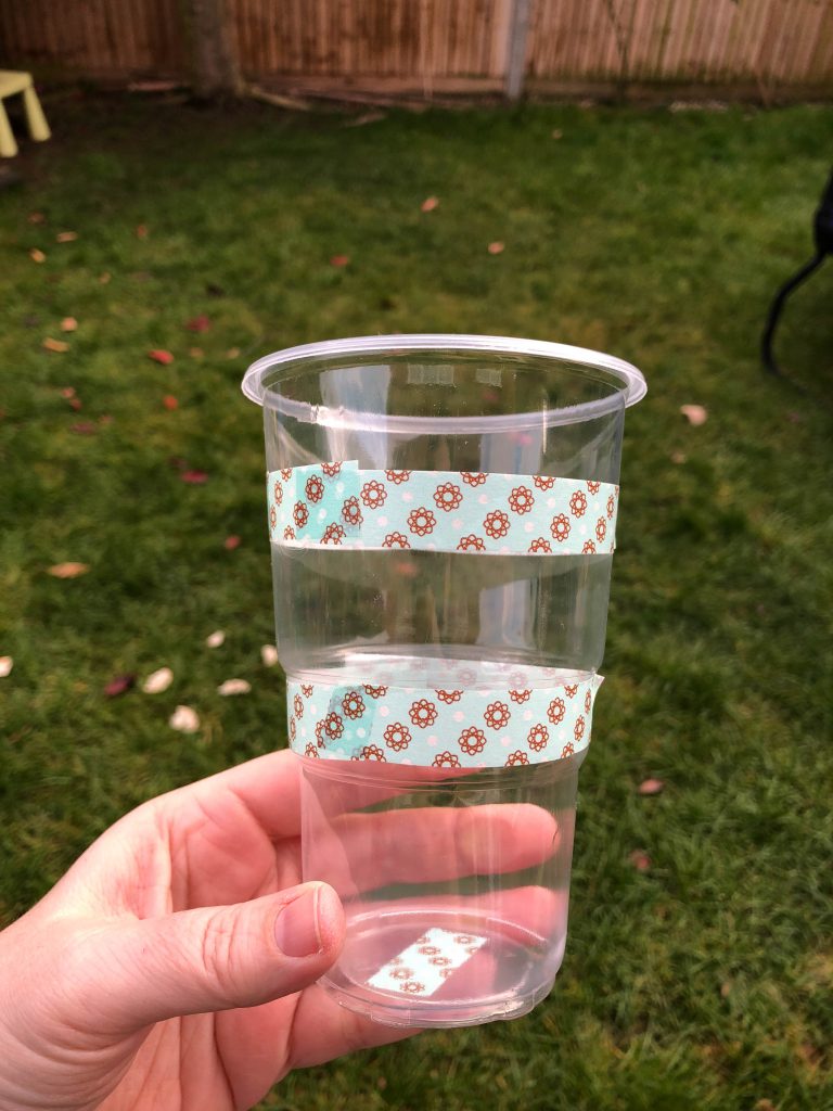 washi tape around a plastic cup