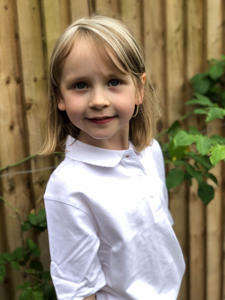 girl wearing school uniform