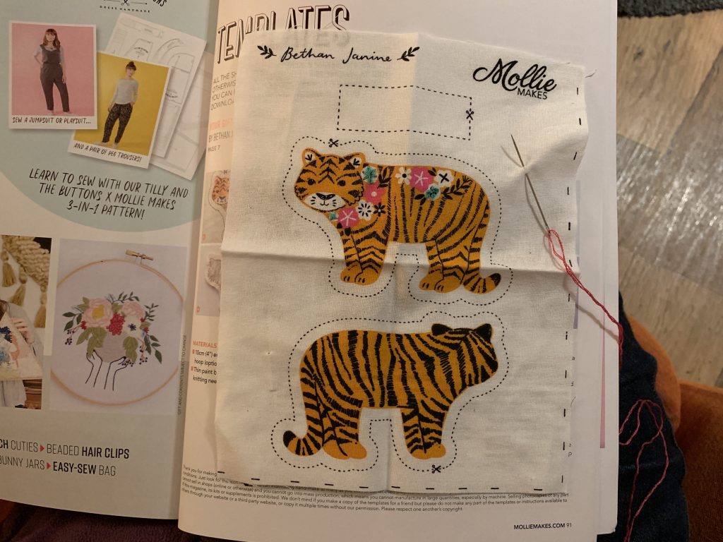 Stitching an embroidered tiger keyring