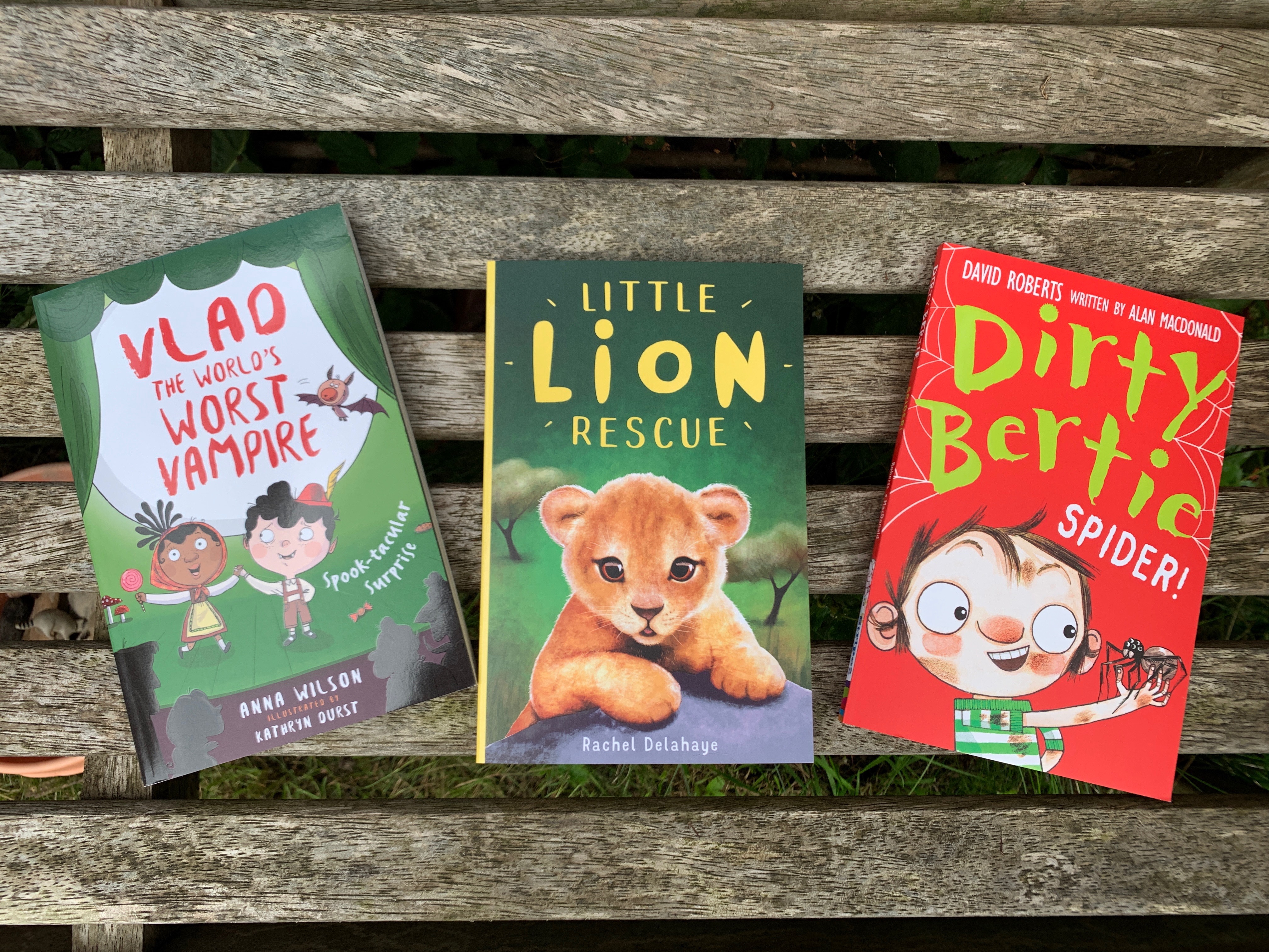 three books on a bench