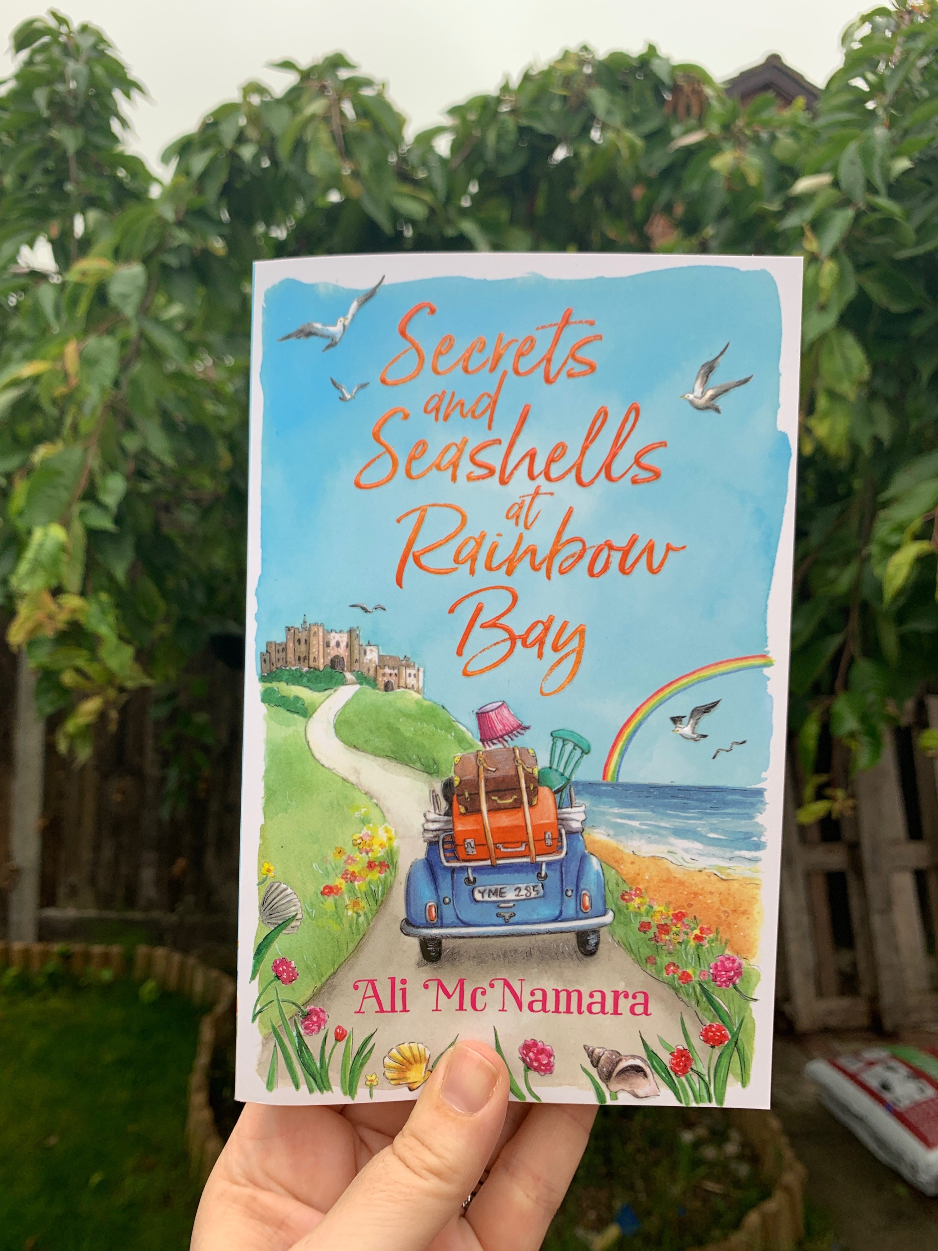 cover of Secrets and Seashells at Rainbow Bay by Ali McNamara
