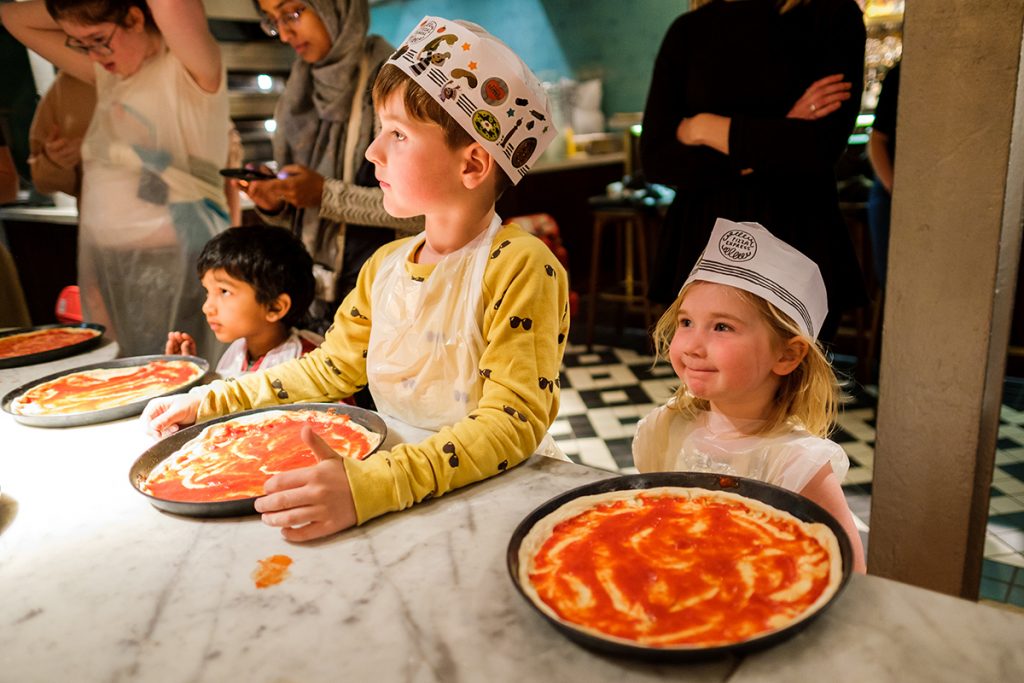 making pizza at Pizza Express