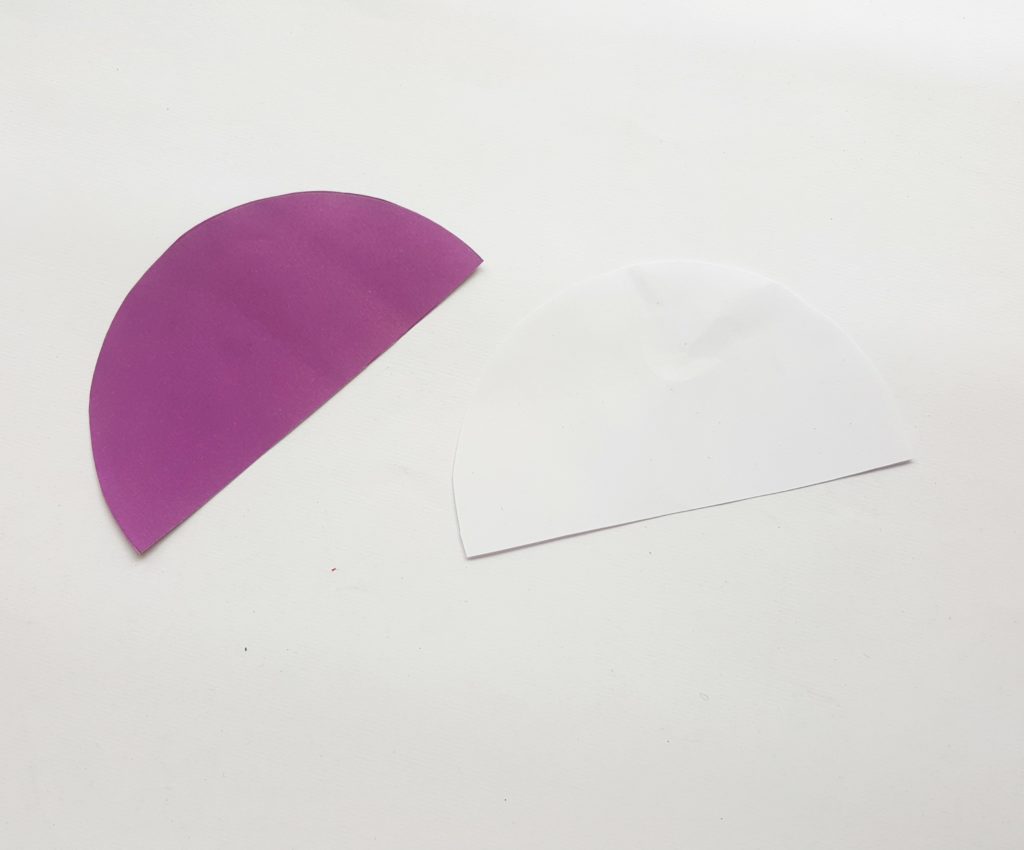 purple semicircle of paper