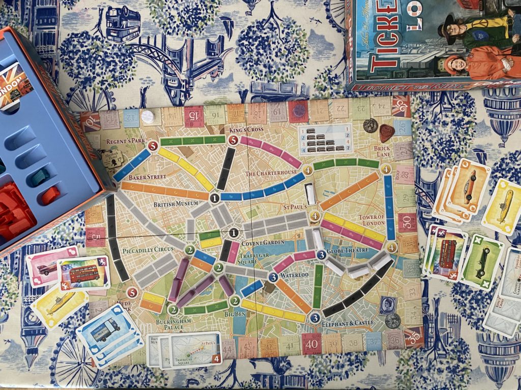 playing the board game Ticket To Ride