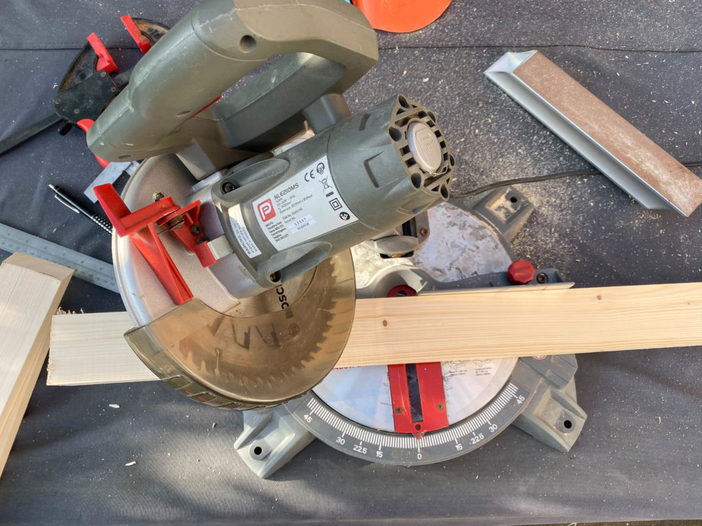 cutting wood with a mitre saw