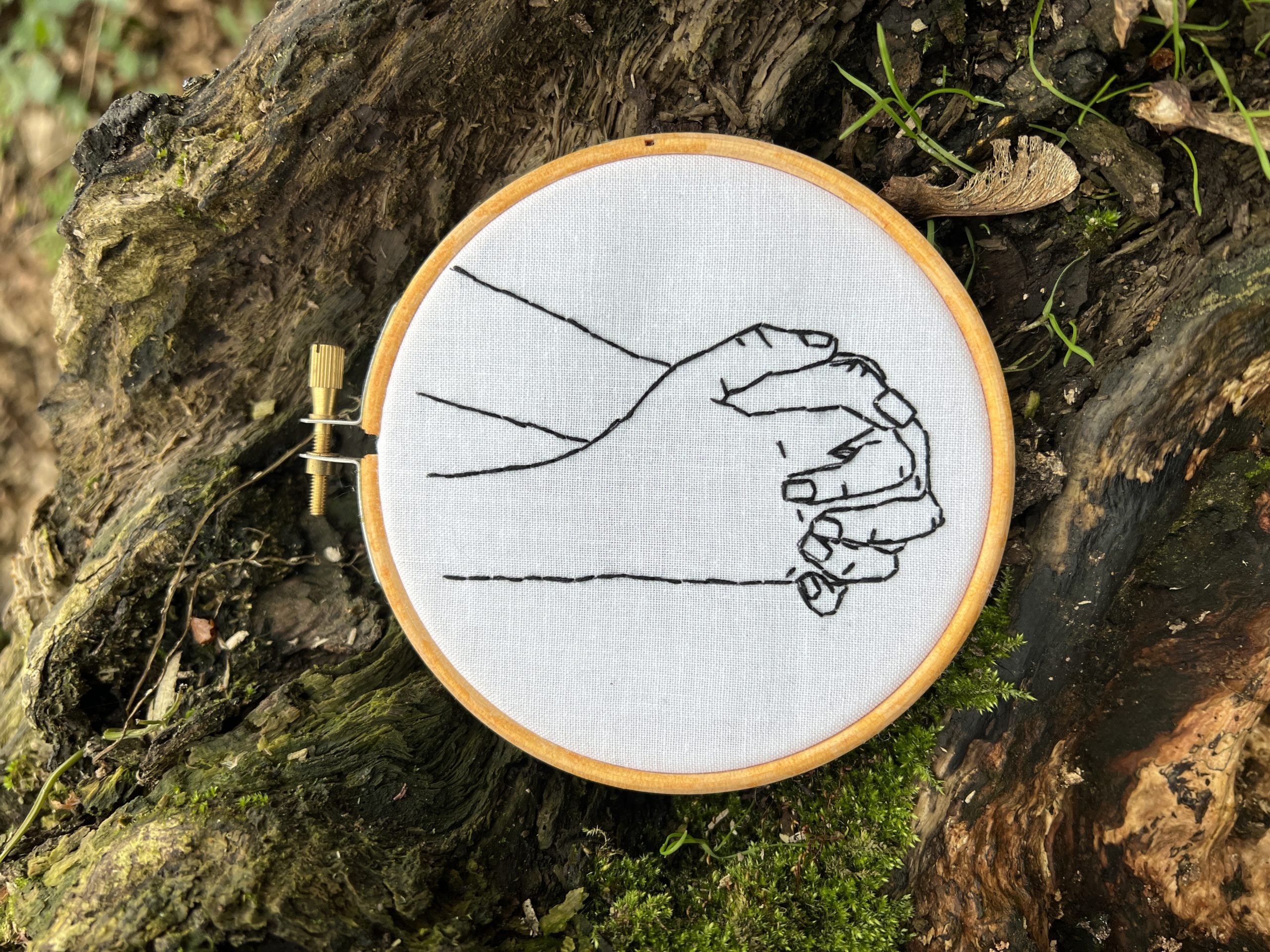 embroidered holding hands hoop