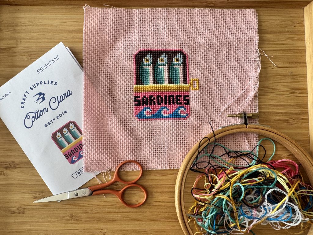 cross stitch sardines in a tin