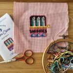 cross stitch sardines in a tin